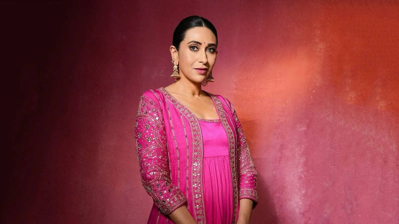 Karisma Kapoor Stuns in Vibrant Rani Pink Desi Look: Perfect Festive Fashion Inspiration!