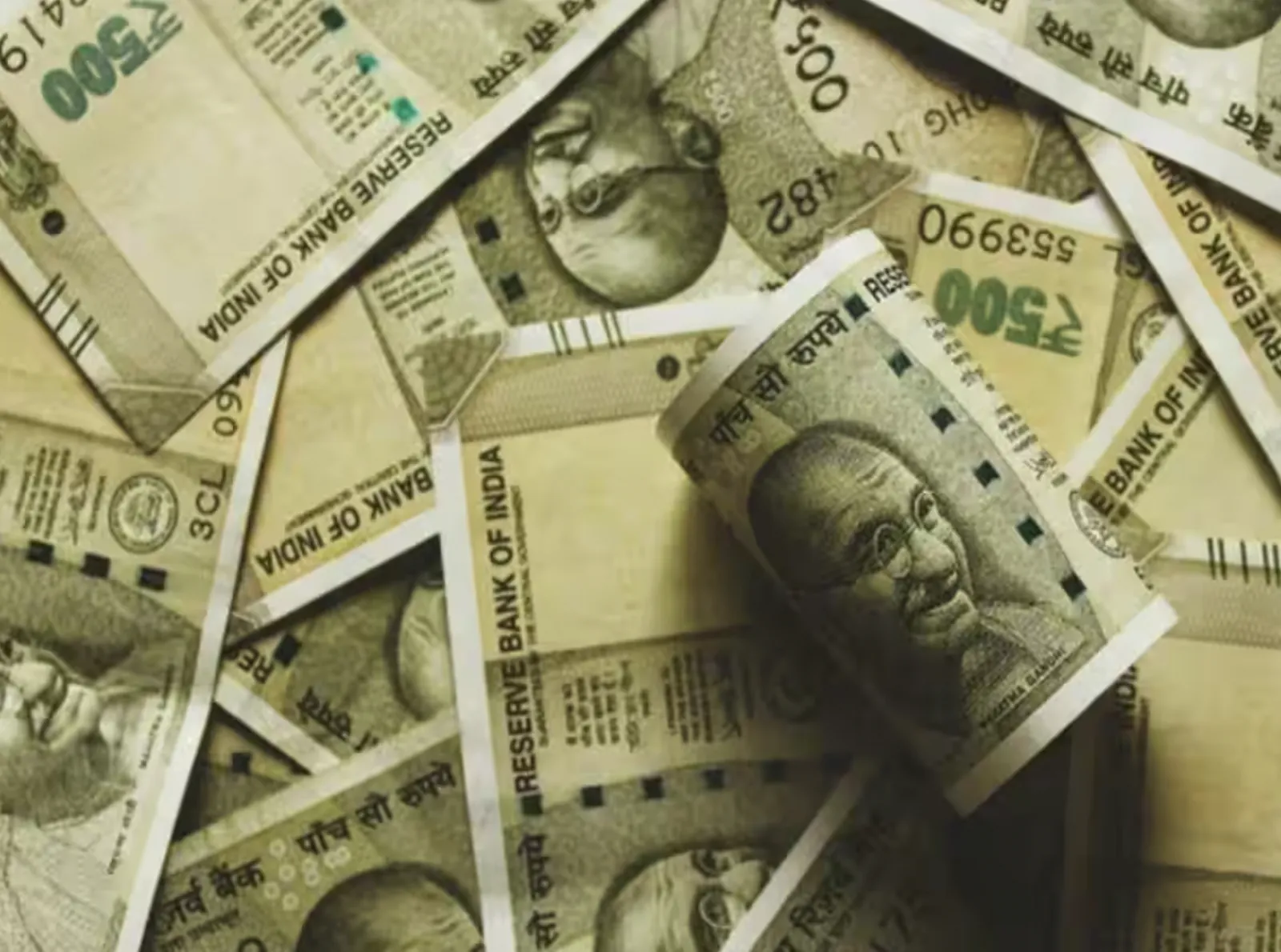 Rupee hits all-time low in early trade; falls 27 paise to 86.31 per dollar